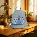 Preciosa mochila con tapa abatible de algodón y lino con diseño de pavo real